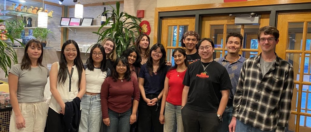 A group of people smiling.